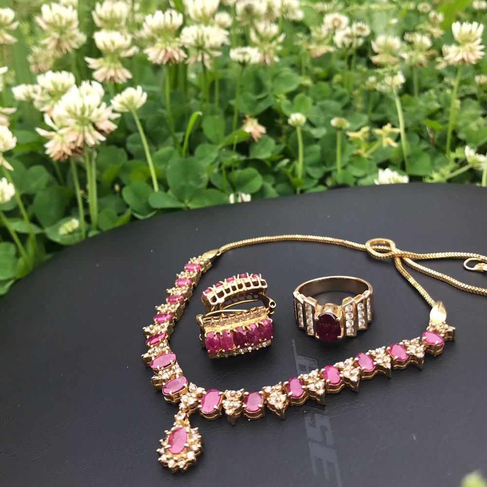 Ruby & diamond set earrings, ring and necklace.